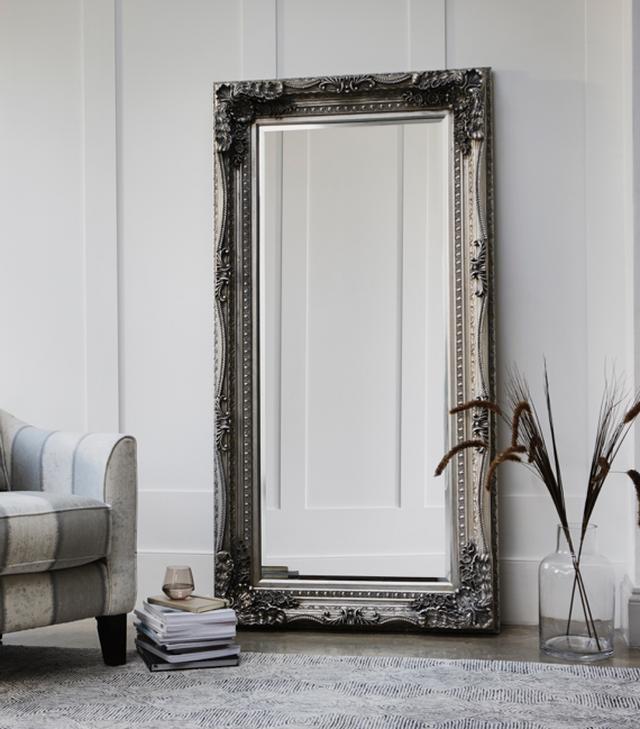 White bedroom ideas – grand silver leaner mirror